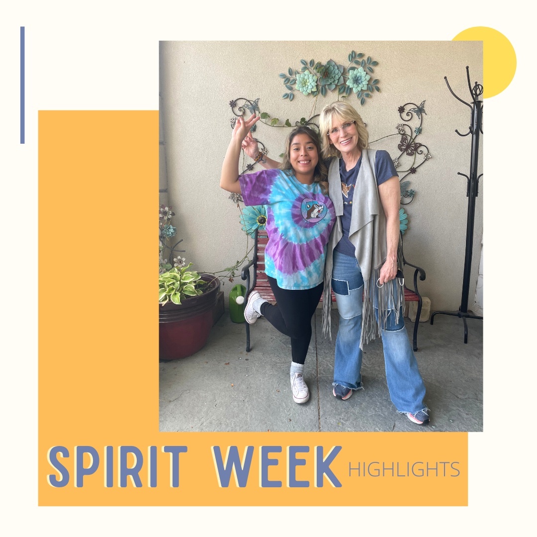Two friends posing happily during Spirit Week with a sunny backdrop.